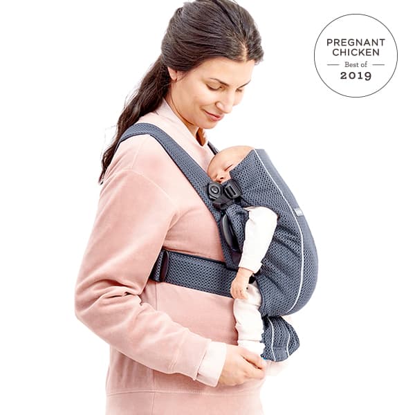 woman wearing baby bjorn baby carrier mini - best baby products 2019