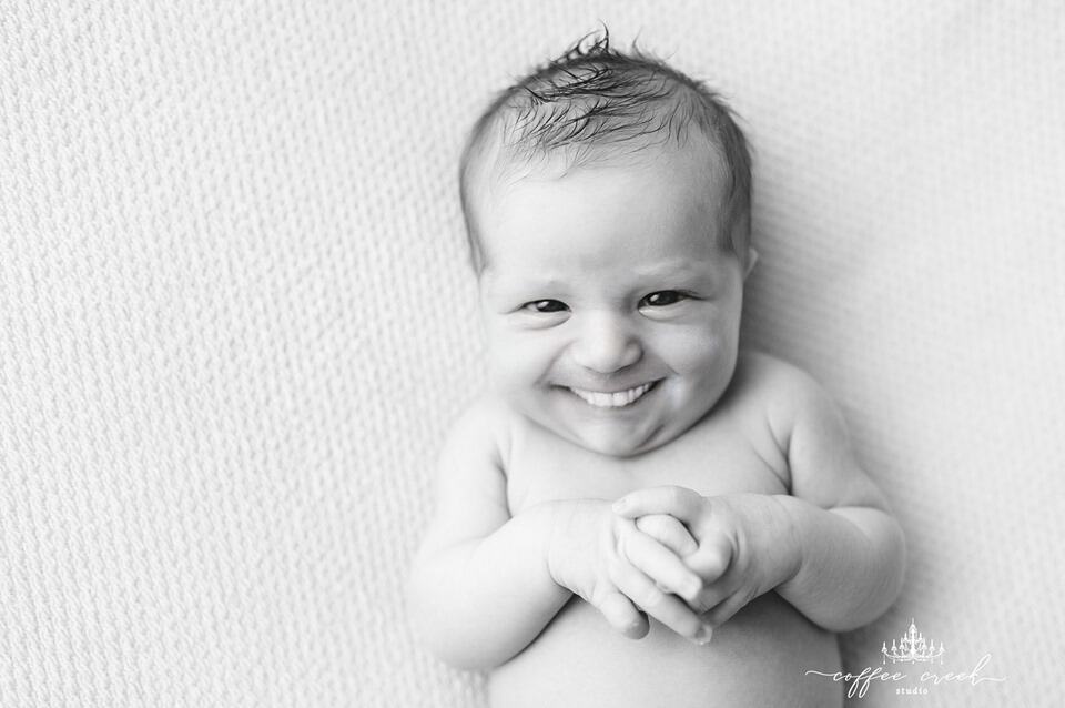 newborn baby with teeth photoshopped in.