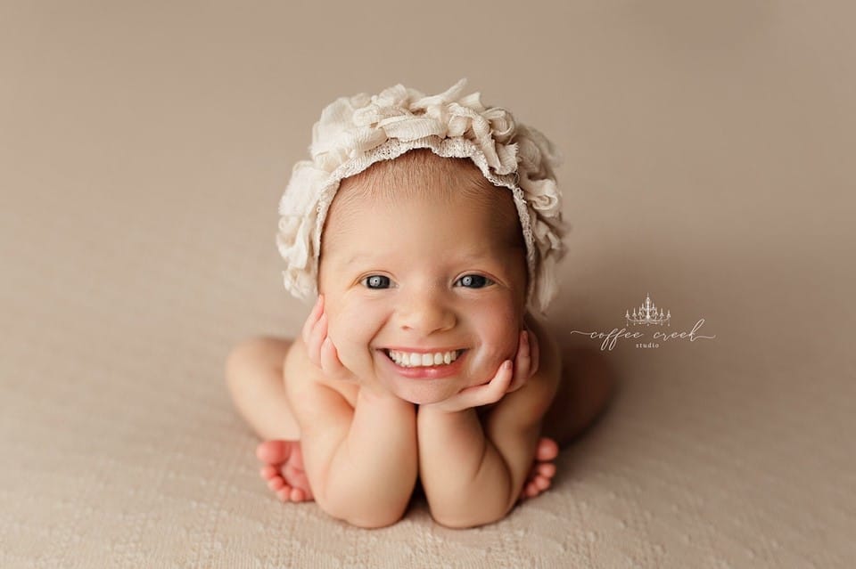 newborn baby with teeth photoshopped in.