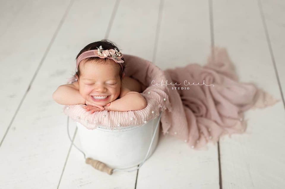 newborn baby with teeth photoshopped in.