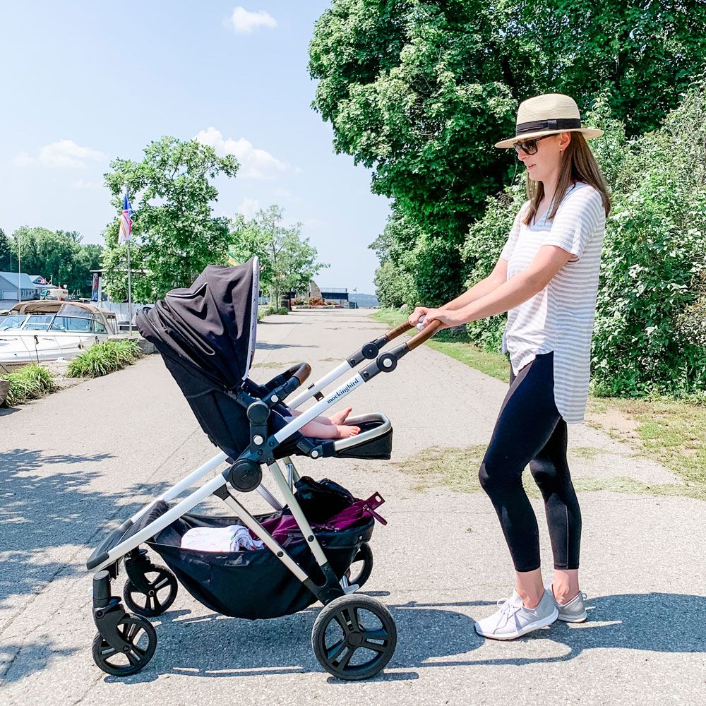 Mom pushing her baby in a Mockingbird stroller