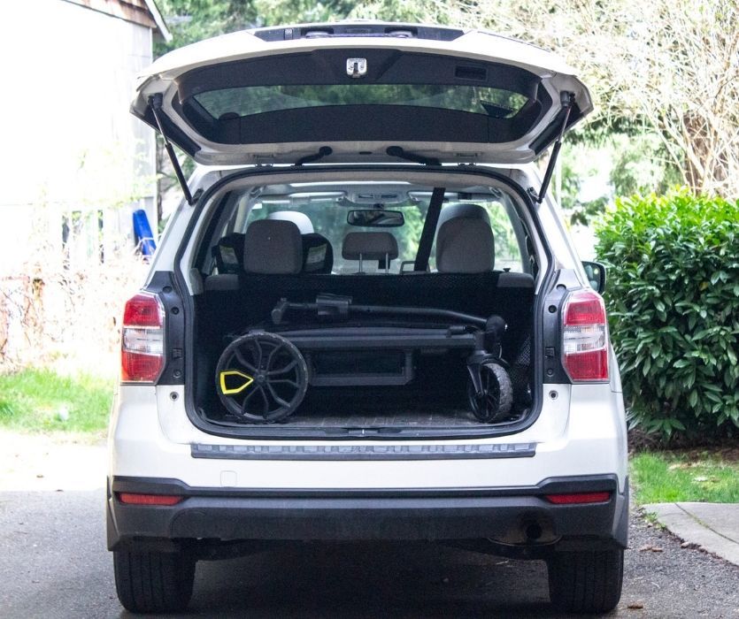 veer wagon folded in the trunk of a car