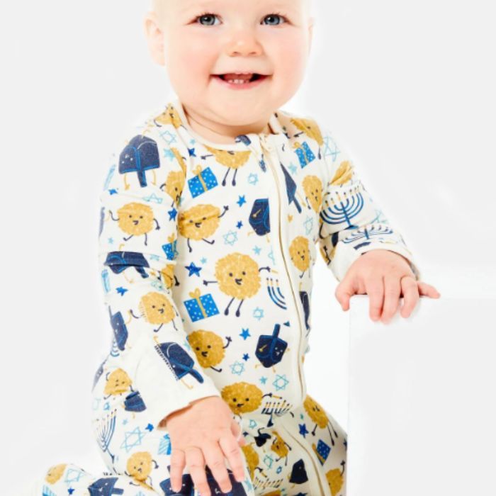 baby wearing Hanukkah pajamas