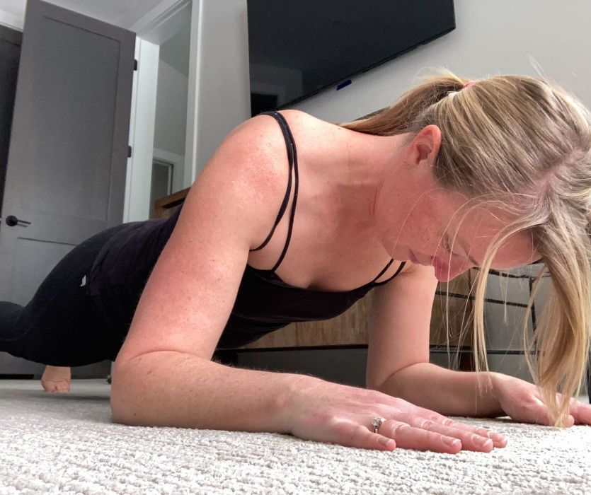 Female doing plank pose