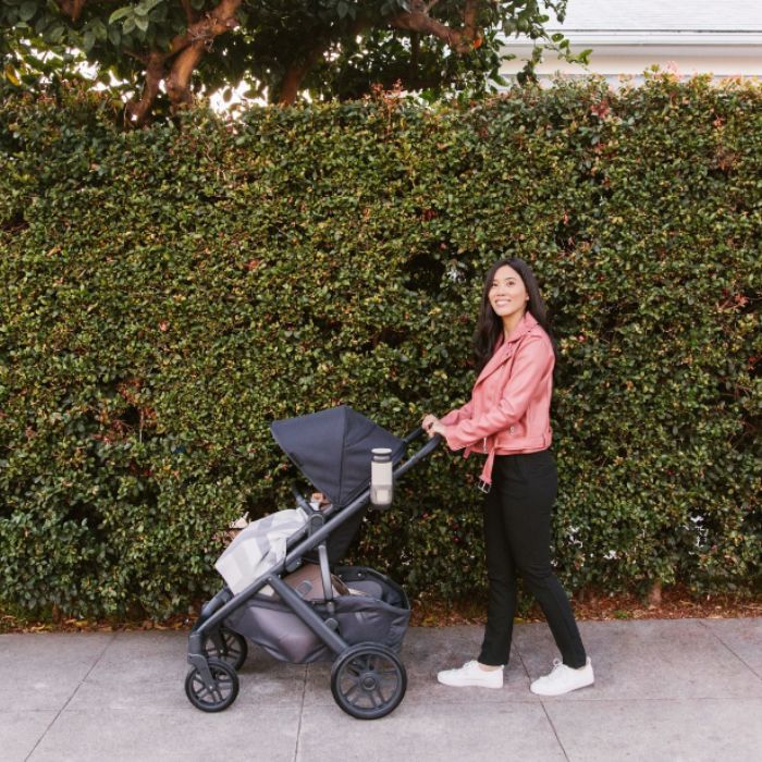 mom pushing baby in a stroller